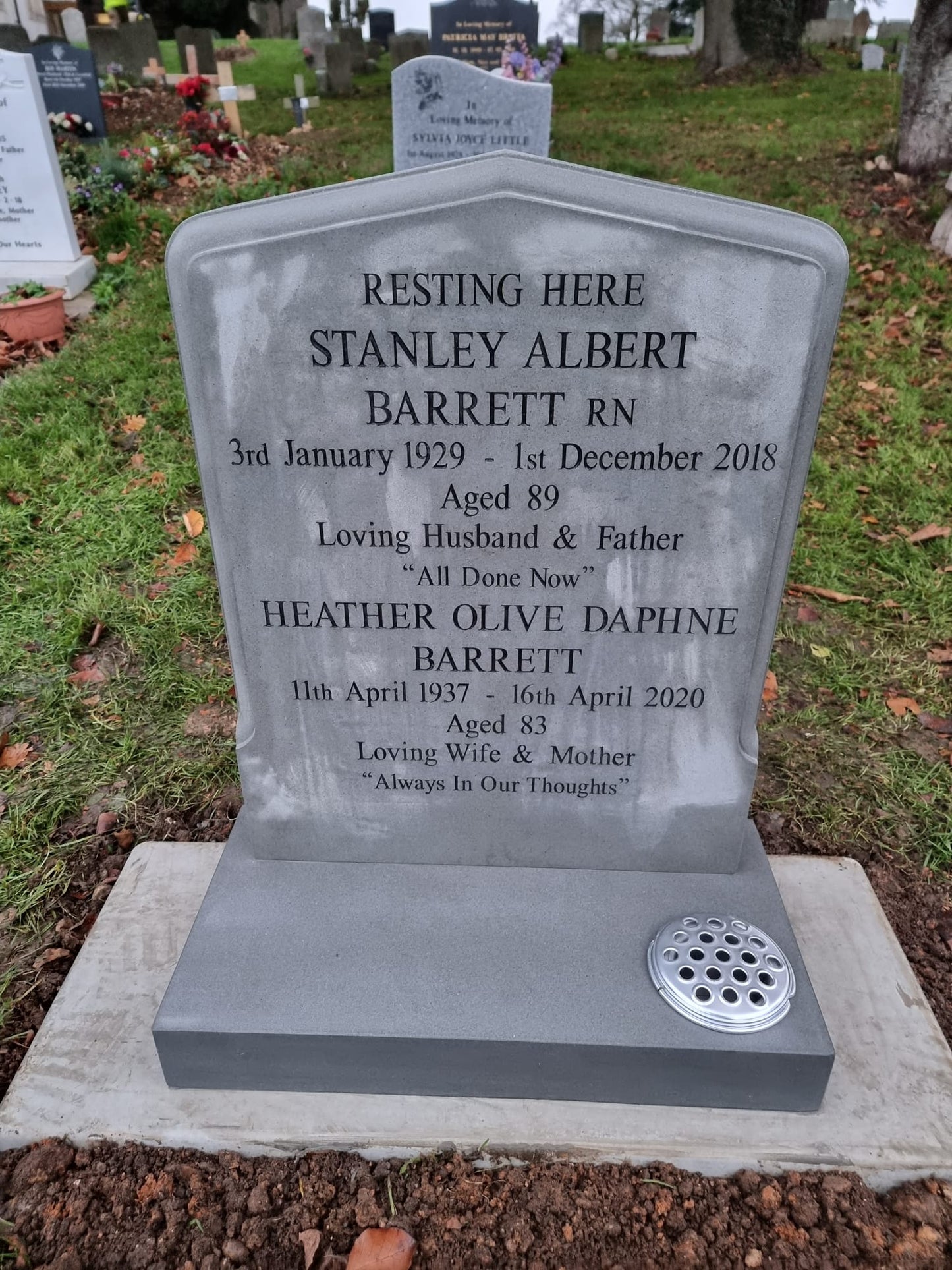 Peon top memorial with sandblasted rose and cross panel