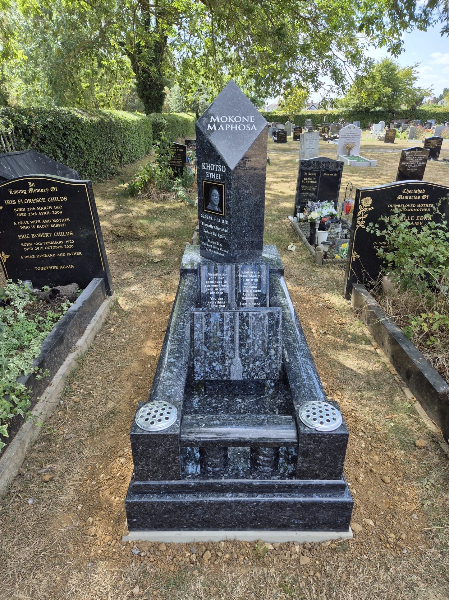 Column memorial with book