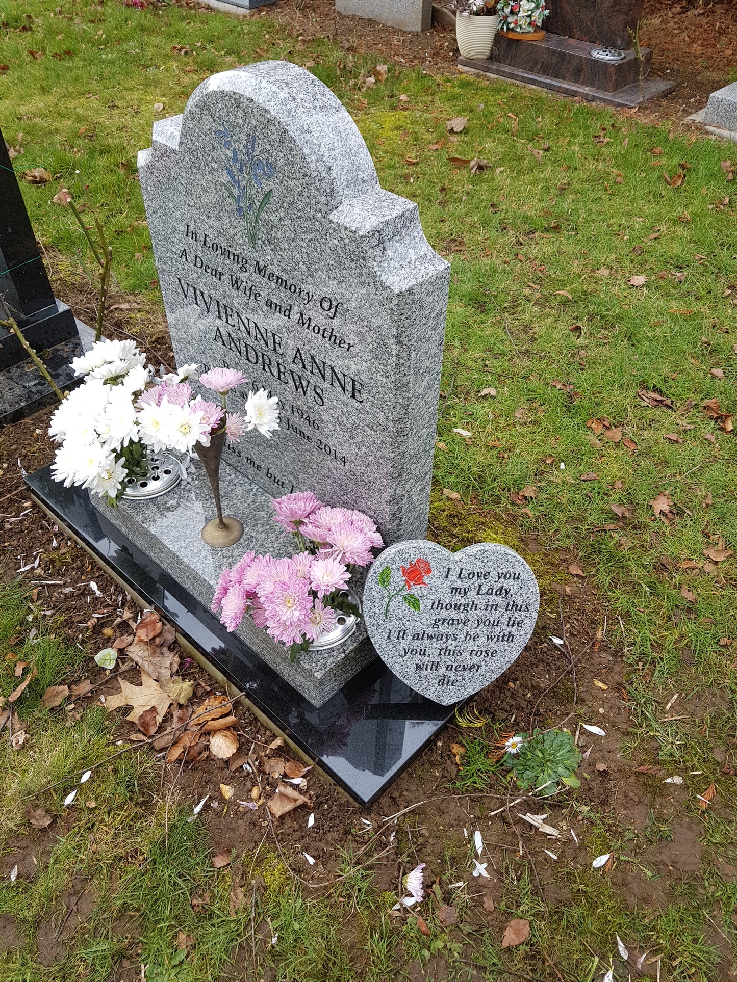Oval top with ogee shoulders memorial with optional baby and moon design
