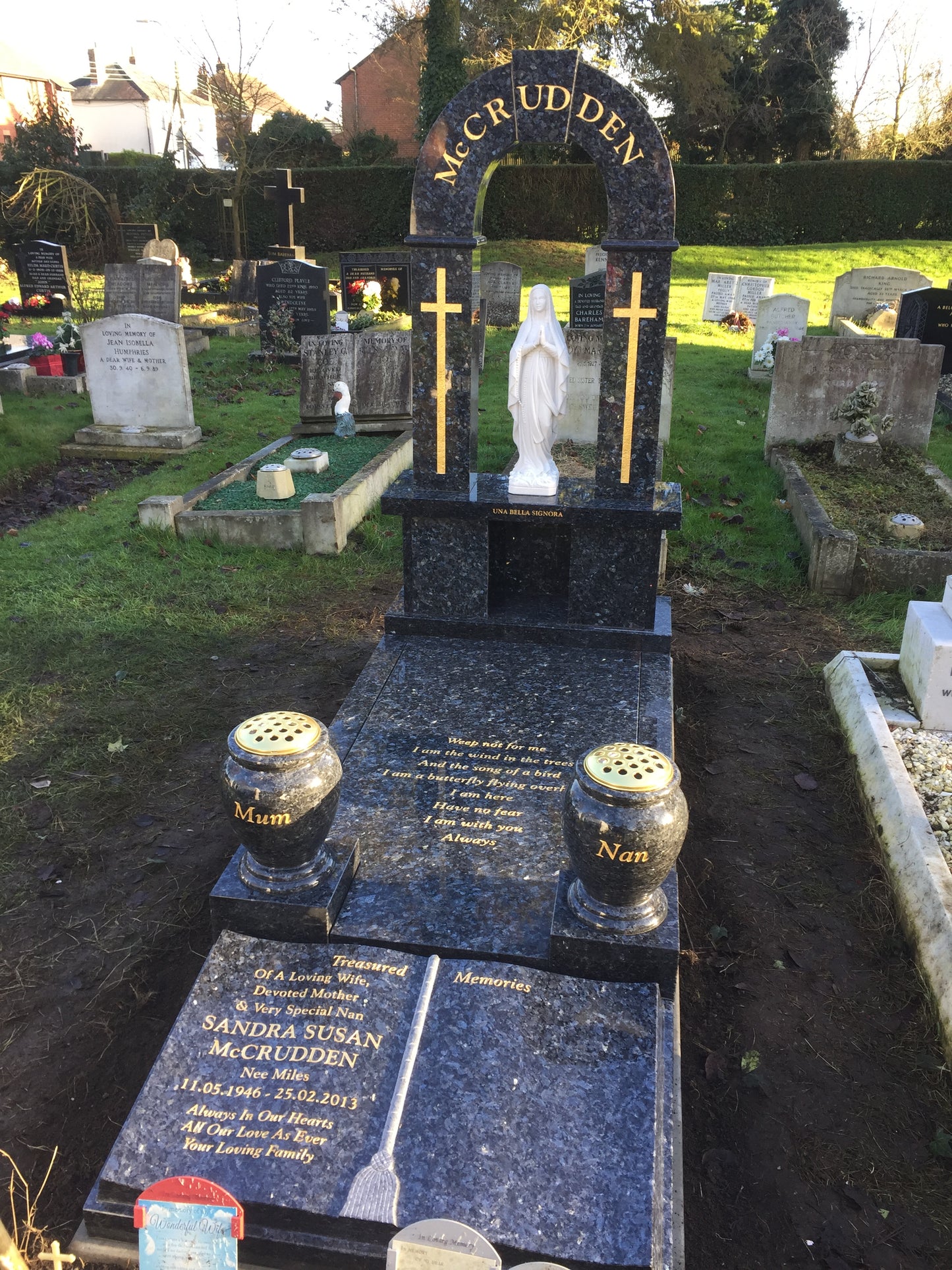Classic square memorial with side columns & layered base
