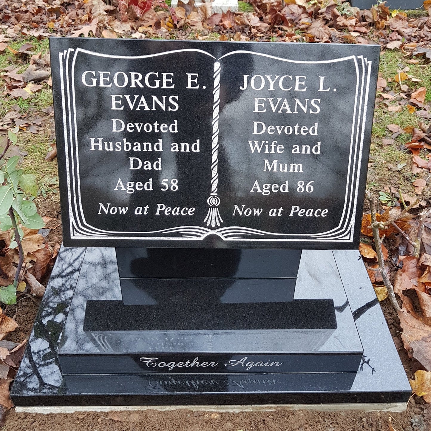 Tablet memorial with etched book and tassel