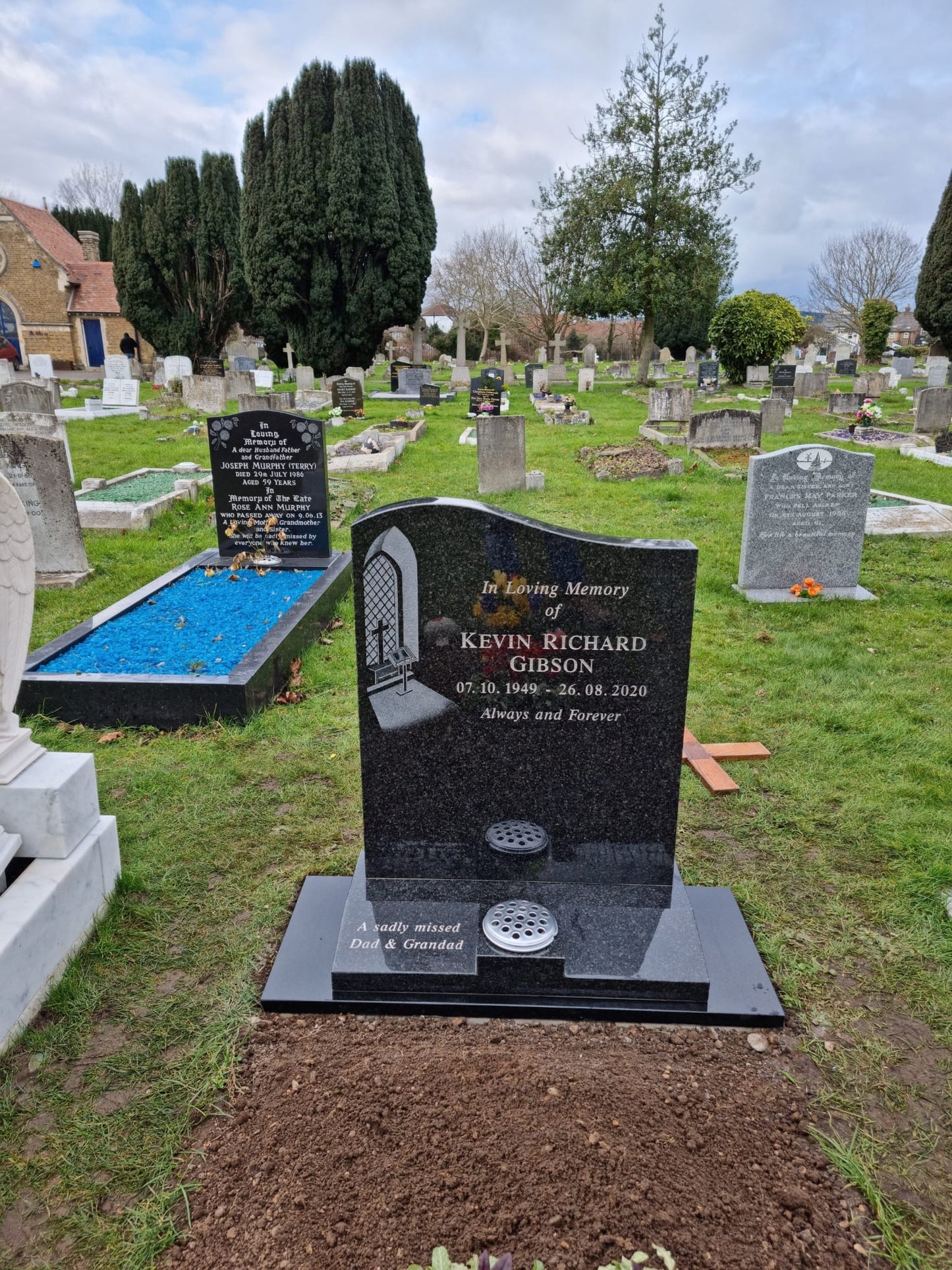 Square top memorial with optional classic church window design.