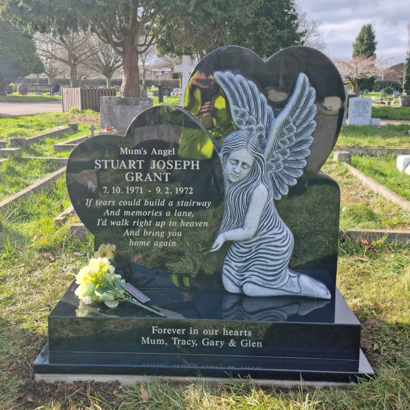 Heart memorial with beautiful carved angel