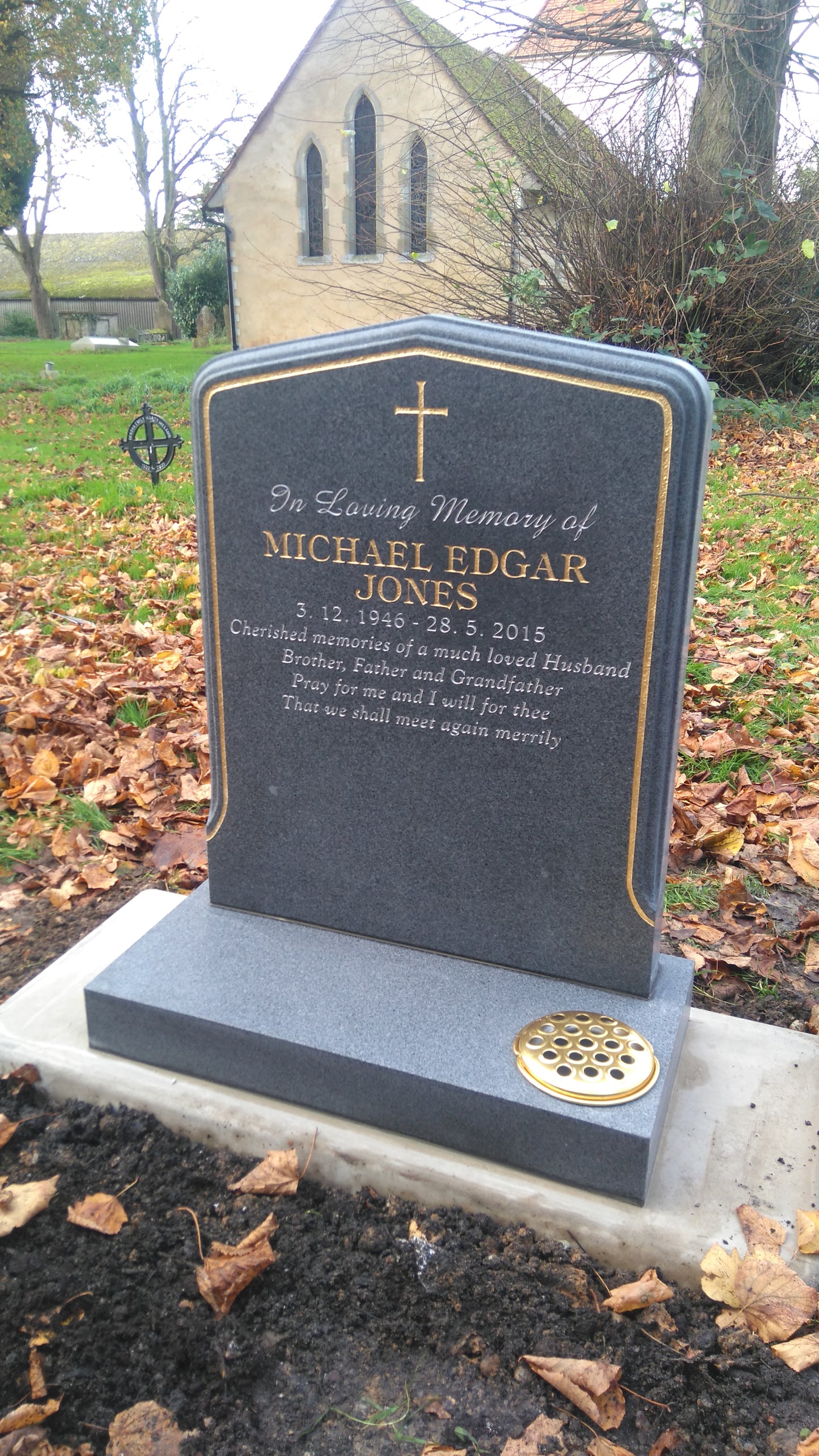 Peon top memorial with sandblasted rose and cross panel