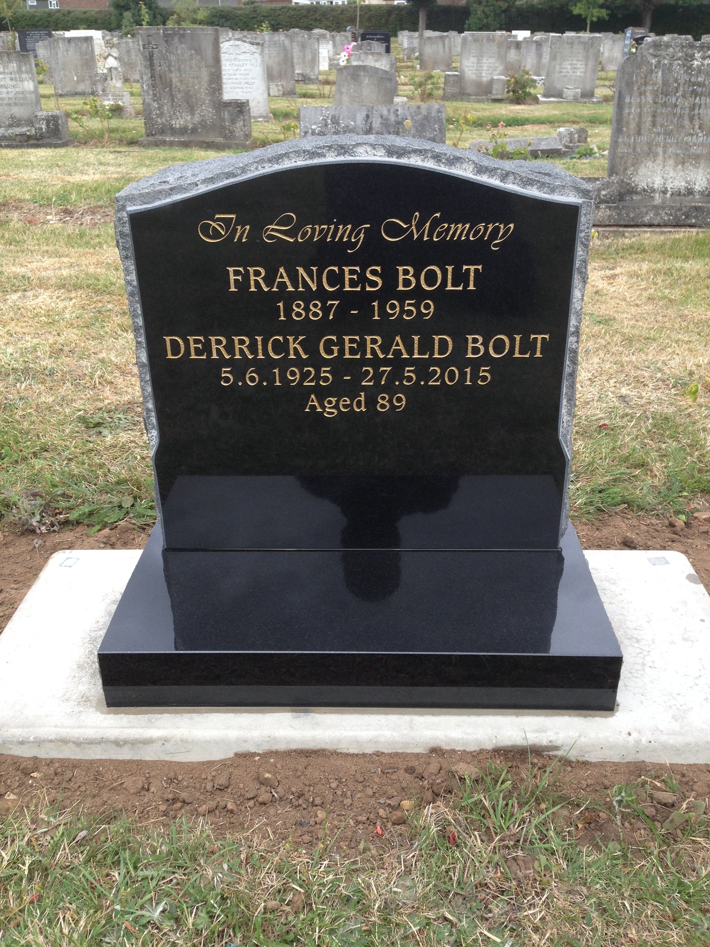 Oval Headstone With Carved Roses