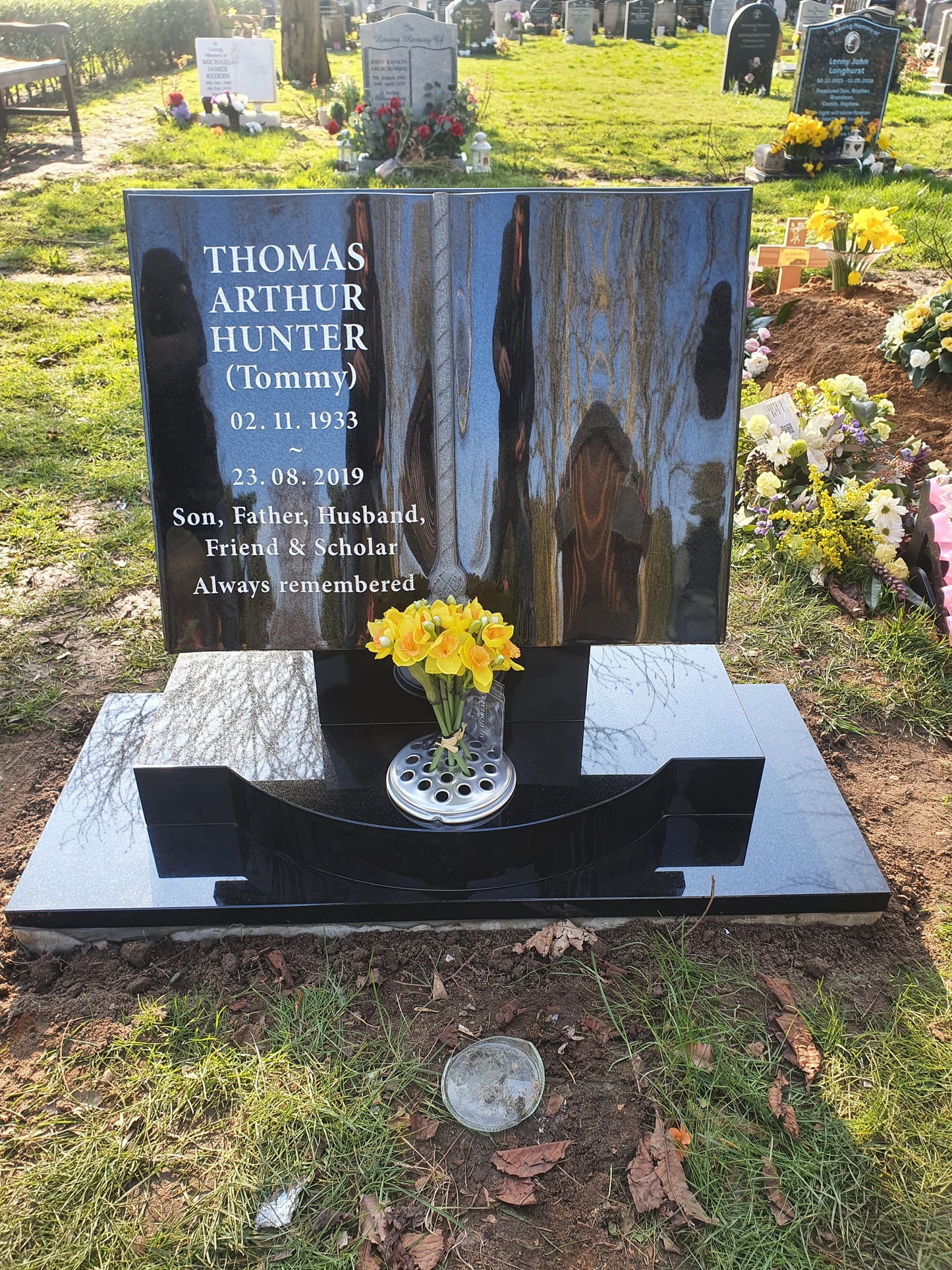 Book Memorial With Stepped Pages And Carved Tassel