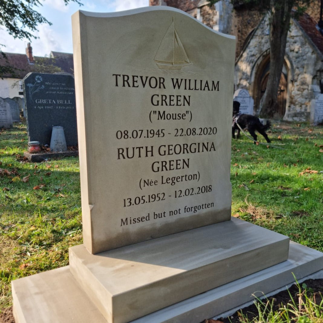 Ogee shaped headstone with a stopped moulded edge