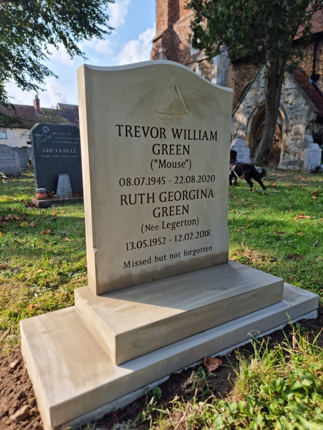 Ogee shaped headstone with a stopped moulded edge