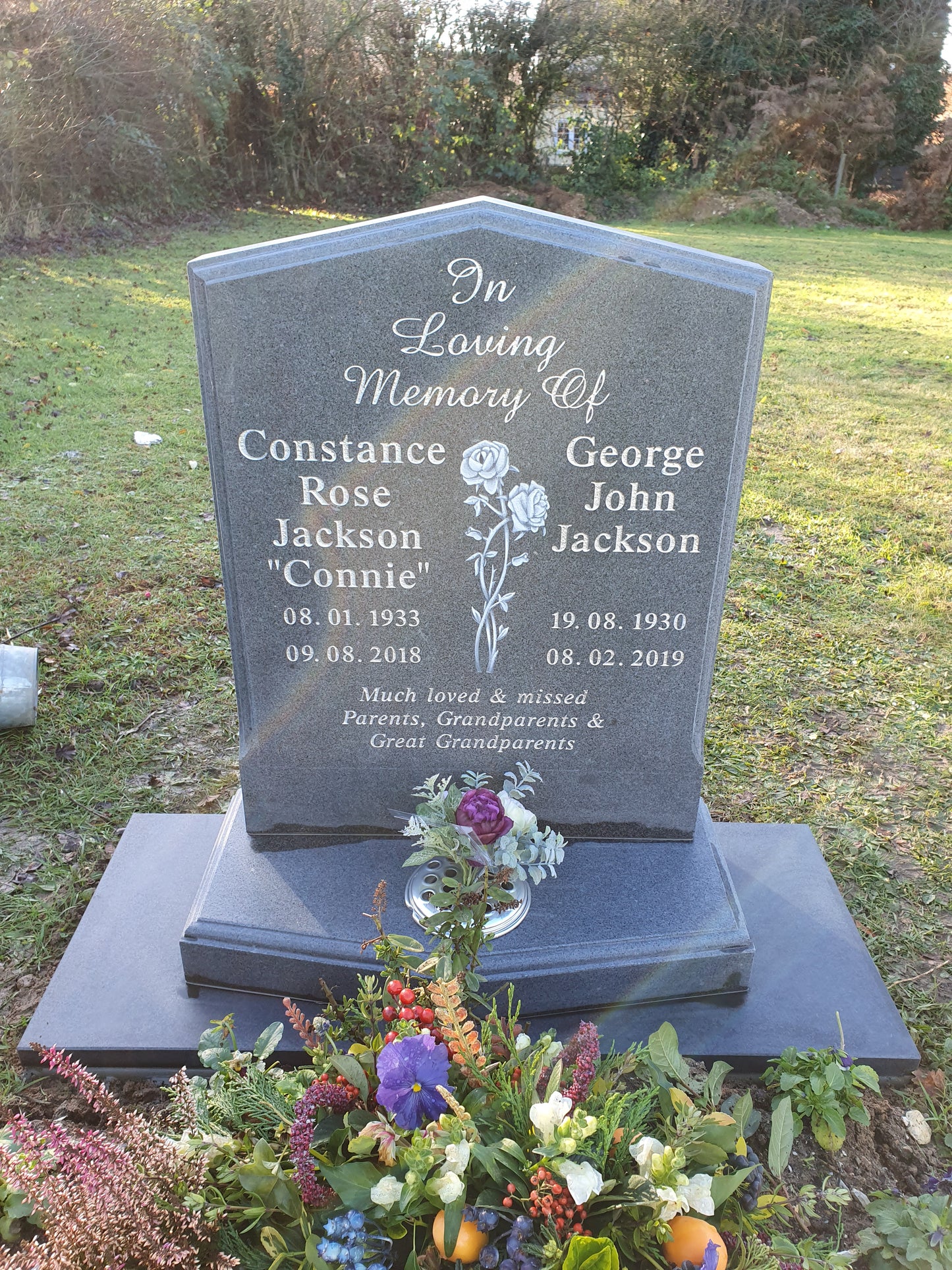 Peon top memorial with sandblasted rose and cross panel