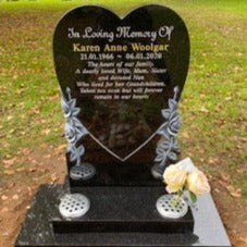 Heart memorial with carved roses to to both sides