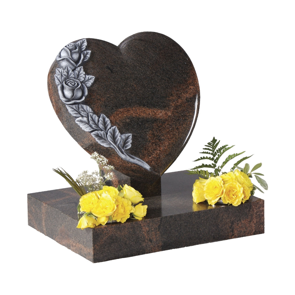 Cushioned heart memorial with carved roses to side