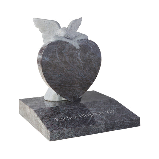 Heart memorial with resting carved angel