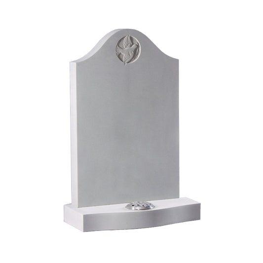 Deep ogee shaped memorial with carved dove of peace
