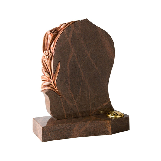 Unique carved memorial with carved flowers and matching base.