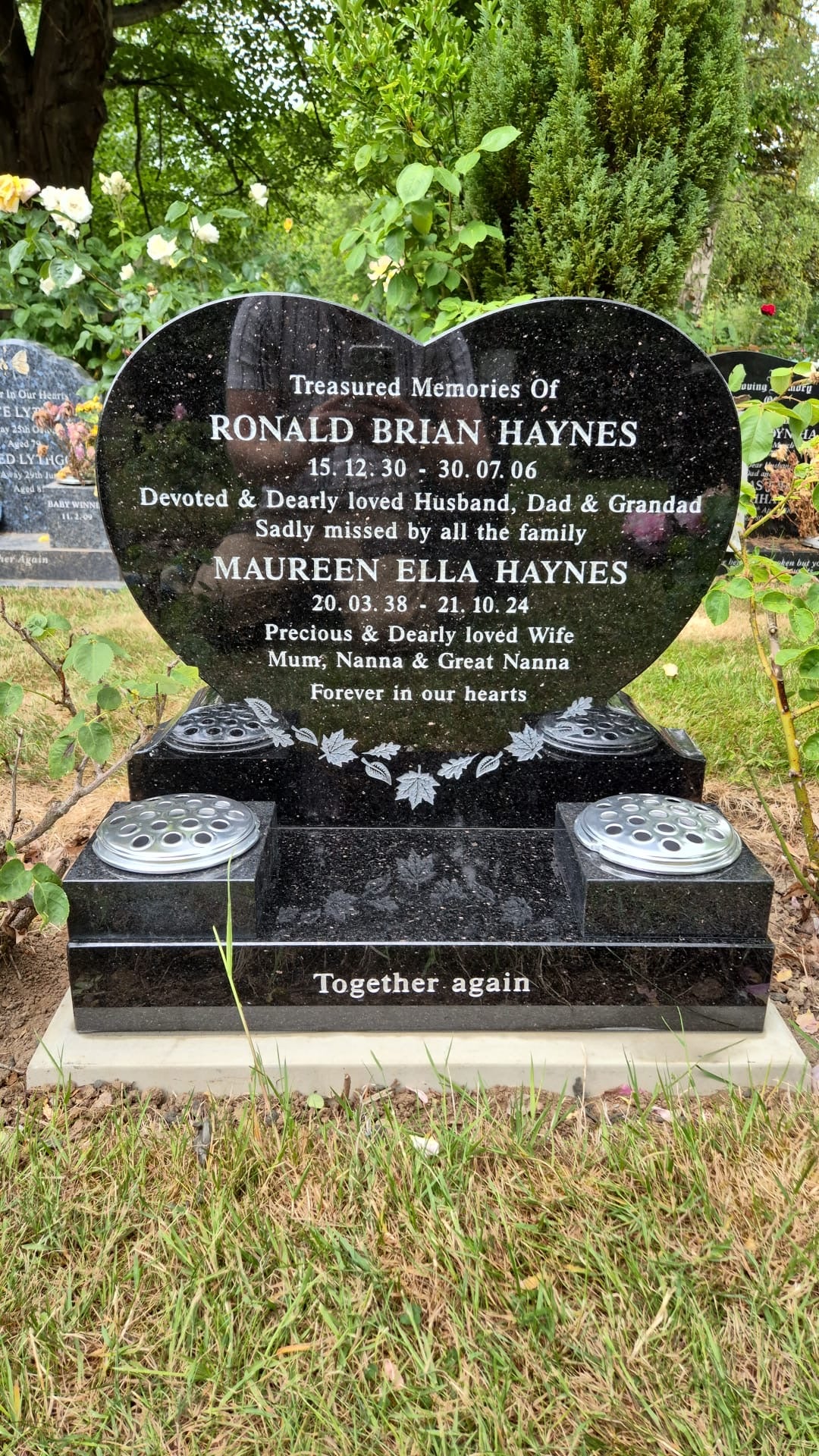 Heart shaped memorial with ogee front base and carved wild roses