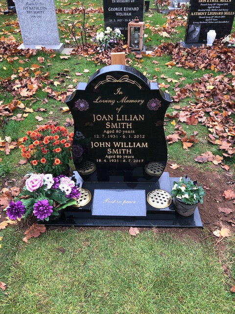 Headstone With Painted Spray Of Lilies