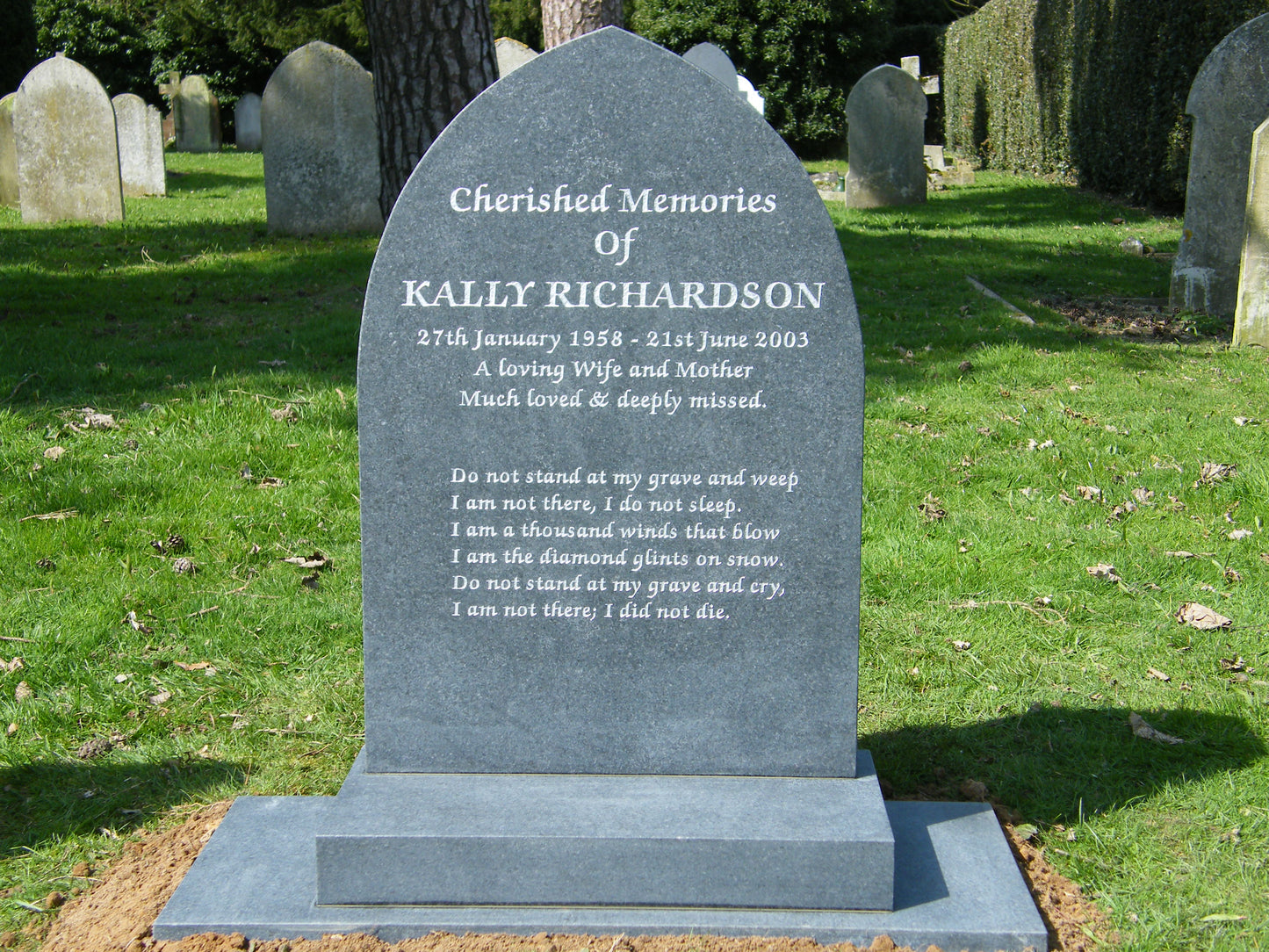 Gothic shape memorial with hand carving