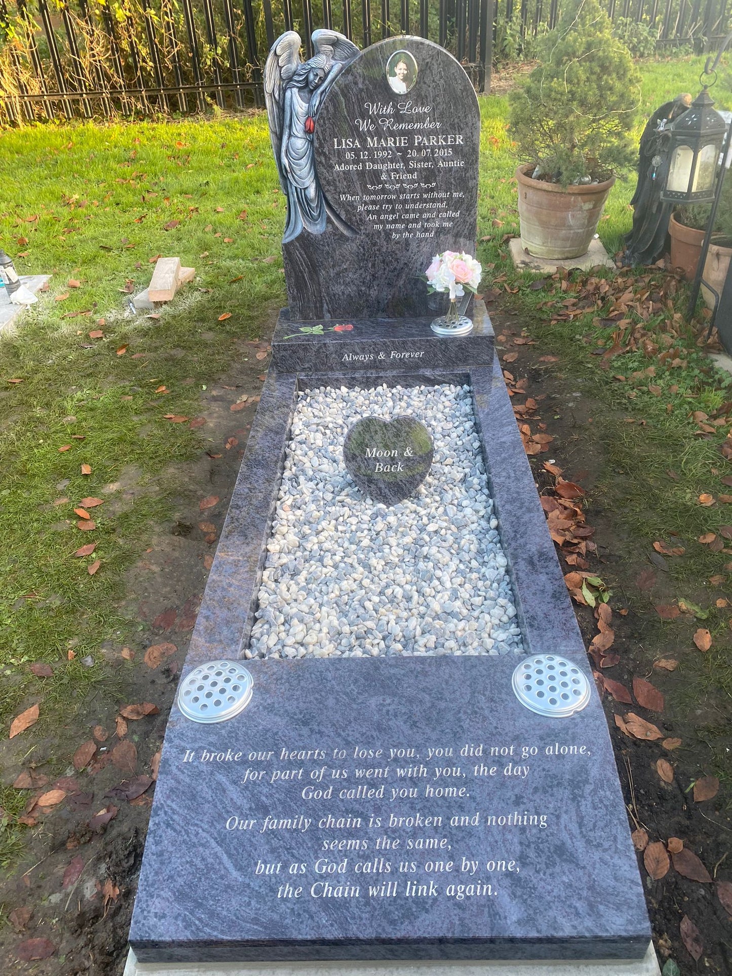 Rounded Headstone With Mourning Angel