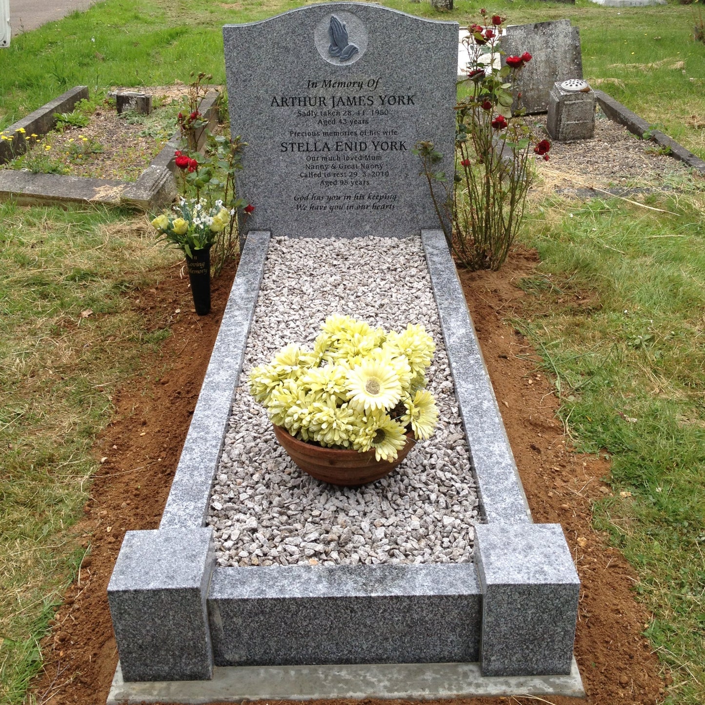 Ogee headstone with kerbs and corner posts