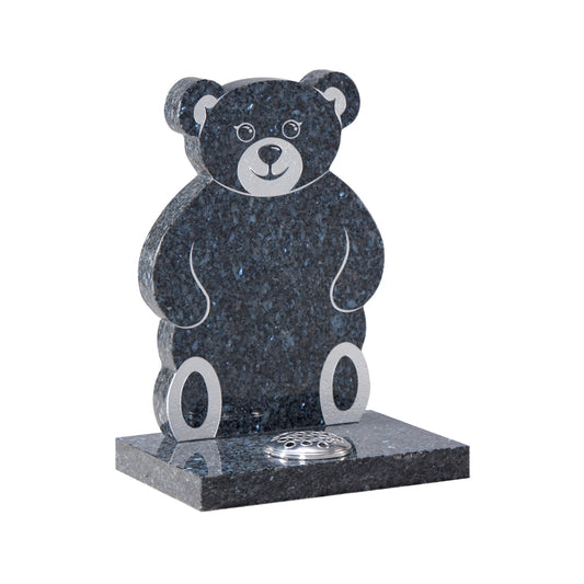 Teddy bear shaped memorial with square base.